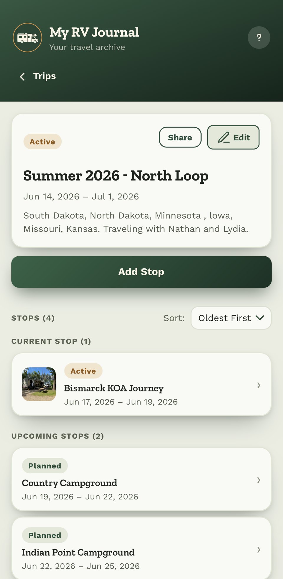 A trip with a stop added, showing dates and status